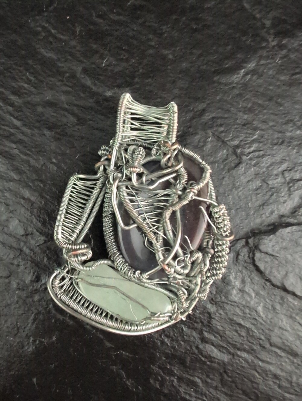 Handcrafted Wire-Wrapped Pendant with Green and Dark Gemstones